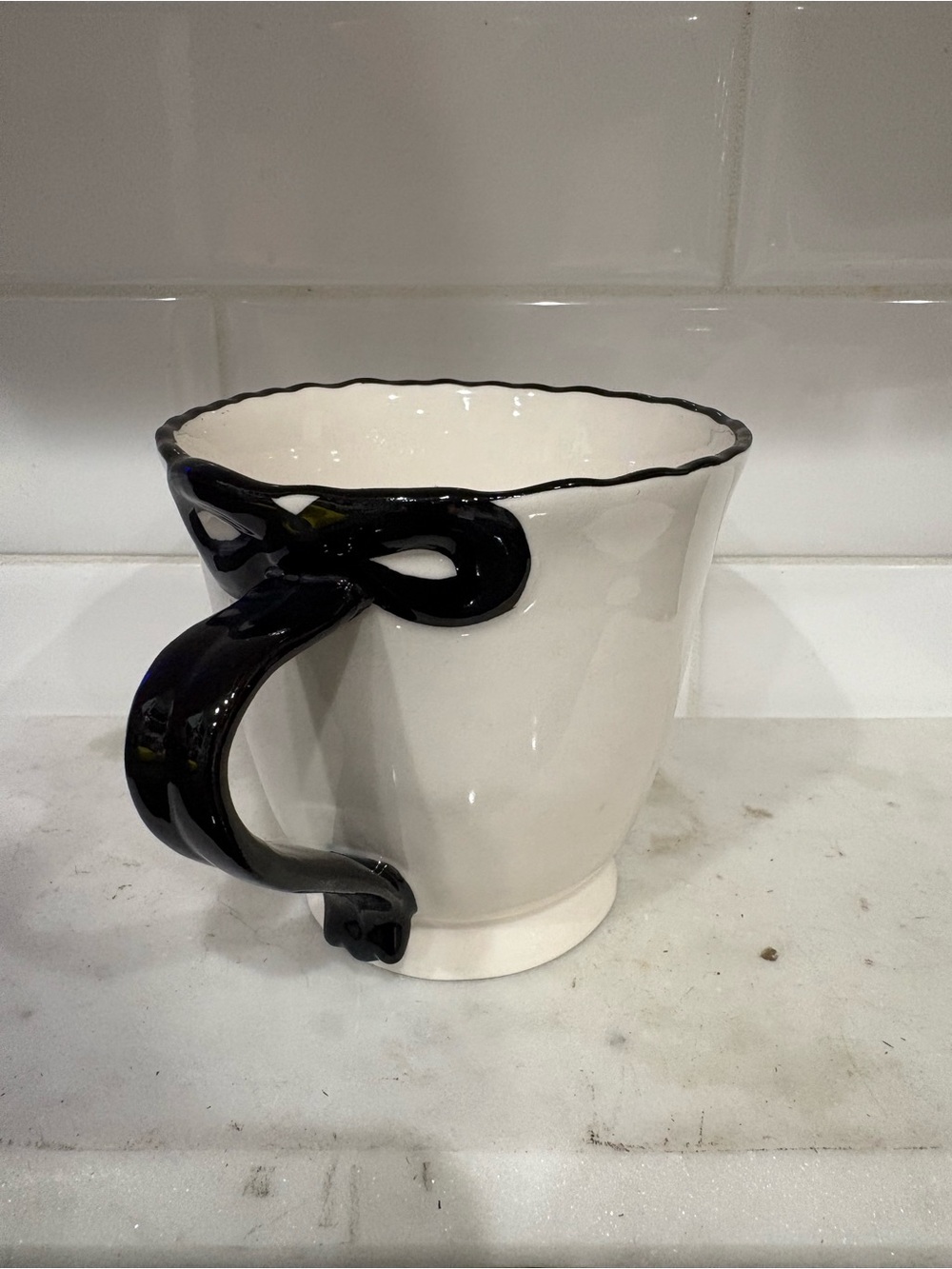 Anthropologie Cream Ceramic Mug with Black Handle Accent